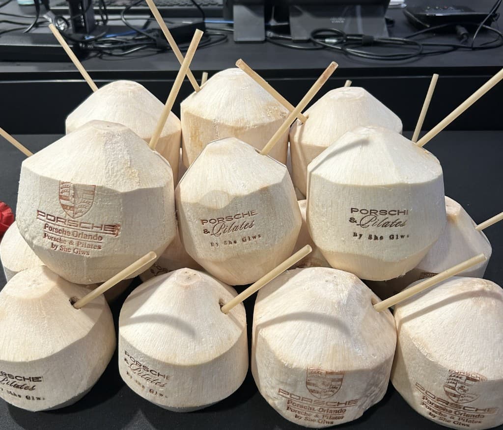 Yaad Coco branded coconuts at a poolside event